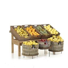 several baskets filled with fruit sitting on top of a wooden table next to each other