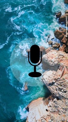 an aerial view of the ocean with a microphone