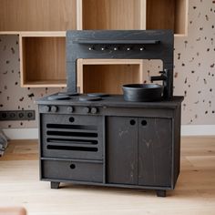 Inspire your little chef or baker with their own little kitchen. The surface has enough space for them to make a 'bake' which can then be popped in the oven (with magnetic door) or set on the hob to 'cook'. Utensils and equipment can then be packed away in the handy cupboard or placed on the rack above the sink. A handcrafted play kitchen featuring an oven, cupboard, hob, sink, water tap, and drawer. The surface is coated with a unique plant-based hard-wax oils and stains produced in Belgium cal Toddler Step Stool, Above The Sink, Wooden Play Kitchen, Kids Play Kitchen, Pretend Play Food, Play Kitchen Sets, Magnetic Door, Step Stool Kids, Kitchen Helper