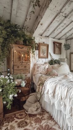 a bed sitting in a bedroom next to a dresser and potted plant on top of it