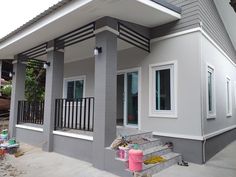 a house that is painted gray and white