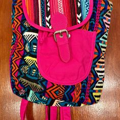 Pretty Backpack With Vibrant Colors. Lined In Rayon, Includes Separate Inner Pocket. Has Magnetic And Drawstring Closure. Adjustable Straps. New With Tags. Non-Smoking Home. Cute Summer Backpack For Everyday Use, Casual Multicolor Backpack For School, Multicolor Casual Backpack For Back To School, Casual Multicolor Backpack For Back To School, Casual Satchel Backpack For Summer, Casual Multicolor School Bag, Trendy Pink Backpack For Daily Use, Casual Multicolor Backpack With Adjustable Straps, Colorful Travel Backpack