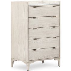 a white chest of drawers with four drawers