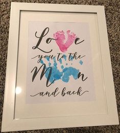 a framed print with the words love you to the moon and back