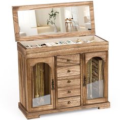 a wooden cabinet with drawers and mirrors on it's sides, in front of a white background