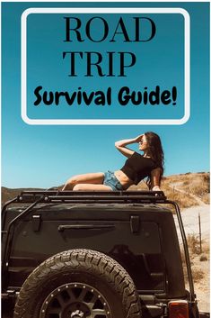 a woman sitting on top of a black jeep with the words road trip survival guide