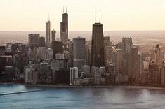 an aerial view of a large city with tall buildings