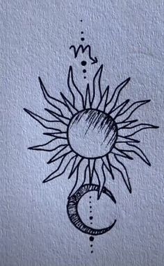 a drawing of a sun and moon on the wall