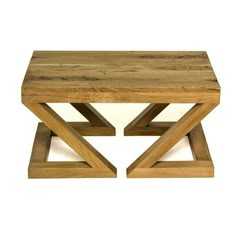 a small wooden table with two intersecting legs