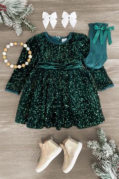 Let your little girl show off her fun festive style in this Green Velvet Sequin Dress. The long sleeve dress features an allover green velvet design with sequin detailing. Shop this holiday dress today! Velvet Sequin Dress, Woman Costumes, Sequin Flower Girl Dress, Holiday Fits, Velvet Design, Sequin Flower, Trendy Christmas Outfits, Crochet Patterns Free Beginner, Girlie Girl