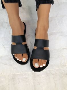 Black leather Slides that are made from 100% Genuine leather in a unique design. Find them only at Christina Christi MATERIALS - 100% Greek Leather - 100% Handmade Sandals. - Each pair of this leather sandals is unique. Sometimes has some small natural marks or light color irregularities. These are absolutely physical, as no chemicals are used. - The sole is lightweight and handmade with of high-durability rubber. You can enjoy miles of safety walk and sandal's soles will be always on shape. SIZ Summer Leather Sandals, Shoes Photography, Handmade Sandals, Womens Summer Shoes, Leather Slide Sandals, Leather Sandals Women, Black Leather Sandals, Sandals Women, Leather Slides