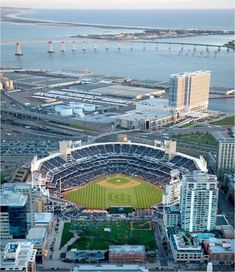 an aerial view of a baseball stadium in the city