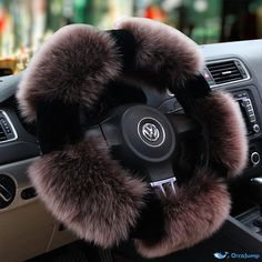 a steering wheel cover with fur on it