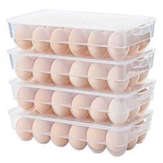 three plastic containers filled with eggs sitting on top of each other