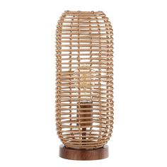 a wooden table lamp that is made out of wicker