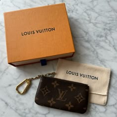 This Item Includes The Original Box, Wrapping And Booklet. Brand New. From Louis Vuitton - The Key Pouch In Iconic Monogram Canvas Is A Playful Yet Practical Accessory That Can Carry Coins, Cards, Folded Bills And Other Small Items, In Addition To Keys. Secured With An Lv-Engraved Zip, It Can Be Hooked Onto The D-Ring Inside Most Louis Vuitton Bags, Or Used As A Bag Or Belt Charm. 4.7 X 2.8 X 0.4 Inches (Length X Height X Width) Monogram Coated Canvas Grained Cowhide-Leather Lining Gold-Color Ha Lv Key Pouch, Louis Vuitton Key Pouch, Pageant Wear, Box Wrapping, Key Pouch, Ring Chain, Bags Louis Vuitton, Louis Vuitton Wallet, Wallet Pouch