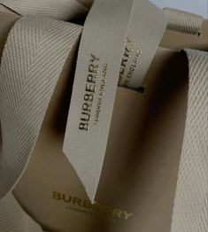 a burberby bag with the tag on it