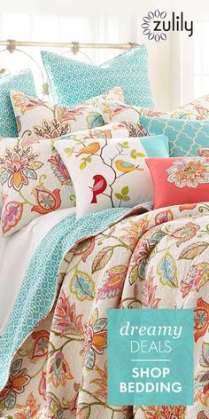 a bed covered in lots of pillows next to a pillow case with the words dreamy details