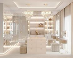 an elegant dressing room with mirrored walls and chandeliers on the ceiling, along with two stools