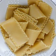 several pieces of ravioli on a white plate