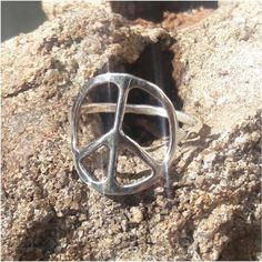 Silver peace sign rings are made by Old Hippie Dave in Safety Harbor, Florida. Each one is hand fabricated out of 925 sterling silver and hand polished. Custom made to your size with 14 gage band. Because this ring is handmade no 2 rings are ever exactly the same. Adjustable Sterling Silver Peace Sign Jewelry, Symbolic Silver Jewelry With Peace Sign, Silver Peace Sign Jewelry Gift, Safety Harbor Florida, Peace Sign Ring, Peace Sign Jewelry, Hippie Rings, Dope Jewelry, Stacked Jewelry