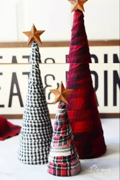 three christmas trees made out of plaid fabric and wooden stars with text overlay that says easy christmas craft diy flannel trees