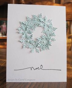 a card with a snowflake design on it