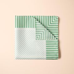 Meet my green silk pocket square, a classic striped neckerchief with tiny dots perfect for weddings and any occasion that you wear your suit jacket. Wonderful for grooms and groomsmen gifts, Sunday best, special occasions, photography sessions, and ring bearers. Not just for special occasions, you can wear it around your neck as a bandana or ascot. A great gift for anniversaries, Father's Day, weddings, or formal occasions. Easy to wear, fold, and tie, and feels great around your neck. Comes in a kraft board gift box- ready for giving. Finished with a rolled baby hem.  The print is permanent and will never fade with use or washing. 16" x 16" square Made To Order The pattern design is created here in my studio, and printed and sewn in Montreal by my amazing printer, they ship it directly to Green And Gold Pocket Square, African Print Pocket Square, Multicolor Rectangular Pocket Square For Gift, Green Formal Pocket Square Handkerchief, Luxury Elegant Rectangular Pocket Square, Classic Solid Pocket Square Handkerchief, Grooms And Groomsmen, Green Pocket Square, Day Weddings