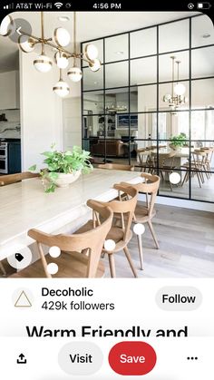 an iphone screenshot of a kitchen and dining room with the words warm friendly and save