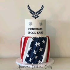 a cake decorated with an american flag and the words congrats it's cool far