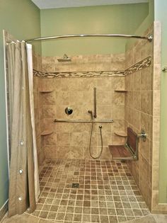 a walk in shower sitting inside of a bathroom