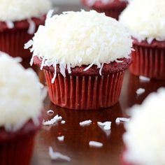 red velvet cupcakes topped with coconut sprinkles