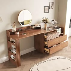 a wooden desk with drawers and a mirror on top of it in a living room