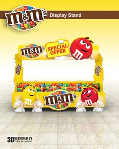 an advertisement for m & m's display stand with different types of candies