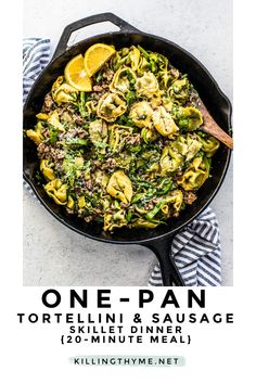 one - pan tortellini and sausage skillet dinner with lemons on the side