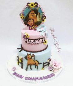 a horse themed birthday cake for a child's first birthday