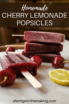 homemade cherry lemonade popsicles on a cutting board