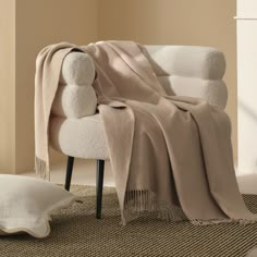 a chair with a blanket on top of it