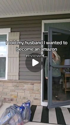 a woman standing in front of a house with an open door that says i told my husband i wanted to become an amazon review