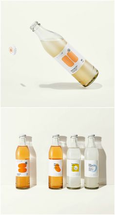 three different shots of orange juice being poured into bottles with the same amount of liquid in them