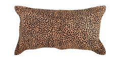 a leopard print pillow on a white background