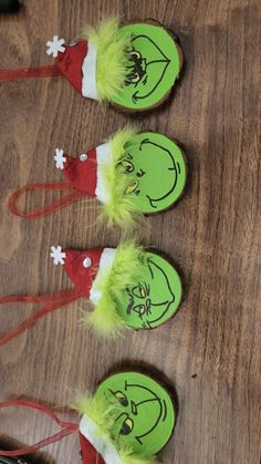 three dr seuss hats on top of a wooden table