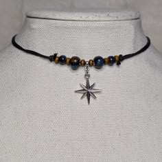 Shining Star Charm Brown And Blue Ceramic Wooden Beaded Boho Hippie Y2k Adjustable Black Rope Cord Choker Necklace Comes On An Adjustable Waxed Black Cord Necklace. Necklace Is Adjustable From Approximately 13" To 22". Choker Necklace Beaded, Masculine Beaded Necklace, Casual Adjustable Star Necklaces, Blue Adjustable Star-shaped Beaded Necklaces, Adjustable Blue Beaded Star Necklaces, Adjustable Blue Star-shaped Beaded Necklace, Cool Beaded Necklaces, Blue Star-shaped Adjustable Necklace, Brown Necklace Jewelry