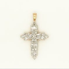 Baguette Cross 14k Yellow Gold, Weighs 1.4 Grams, It Has A 0.18 Carat Total Weight In The Diamonds (Chain Is Not Included) White Baguette Diamond Pendant Jewelry, Timeless White Baguette Jewelry, Timeless White Baguette Diamond Jewelry, Timeless White Jewelry With Baguette Diamonds, White Baguette Fine Jewelry, Elegant Cross Shaped Jewelry With Baguette Diamonds, Elegant Cross Jewelry With Baguette Diamonds, White Baguette Jewelry For Gift, Diamond Cross Necklace