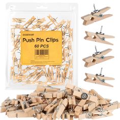 wooden push pin clips in plastic package with box and clippings on white background