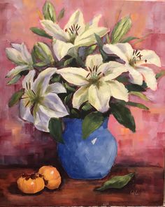 a painting of white lilies in a blue vase on a table with oranges