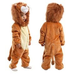 two toddlers dressed in lion onesuits standing next to each other on white background