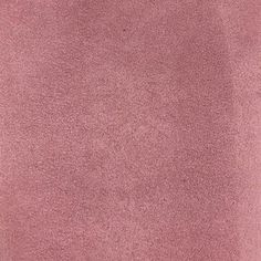 a close up view of a pink carpet