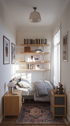 a bedroom with a bed, bookshelf and rug on the floor in front of it