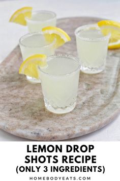 three lemon drop shooters on a marble platter